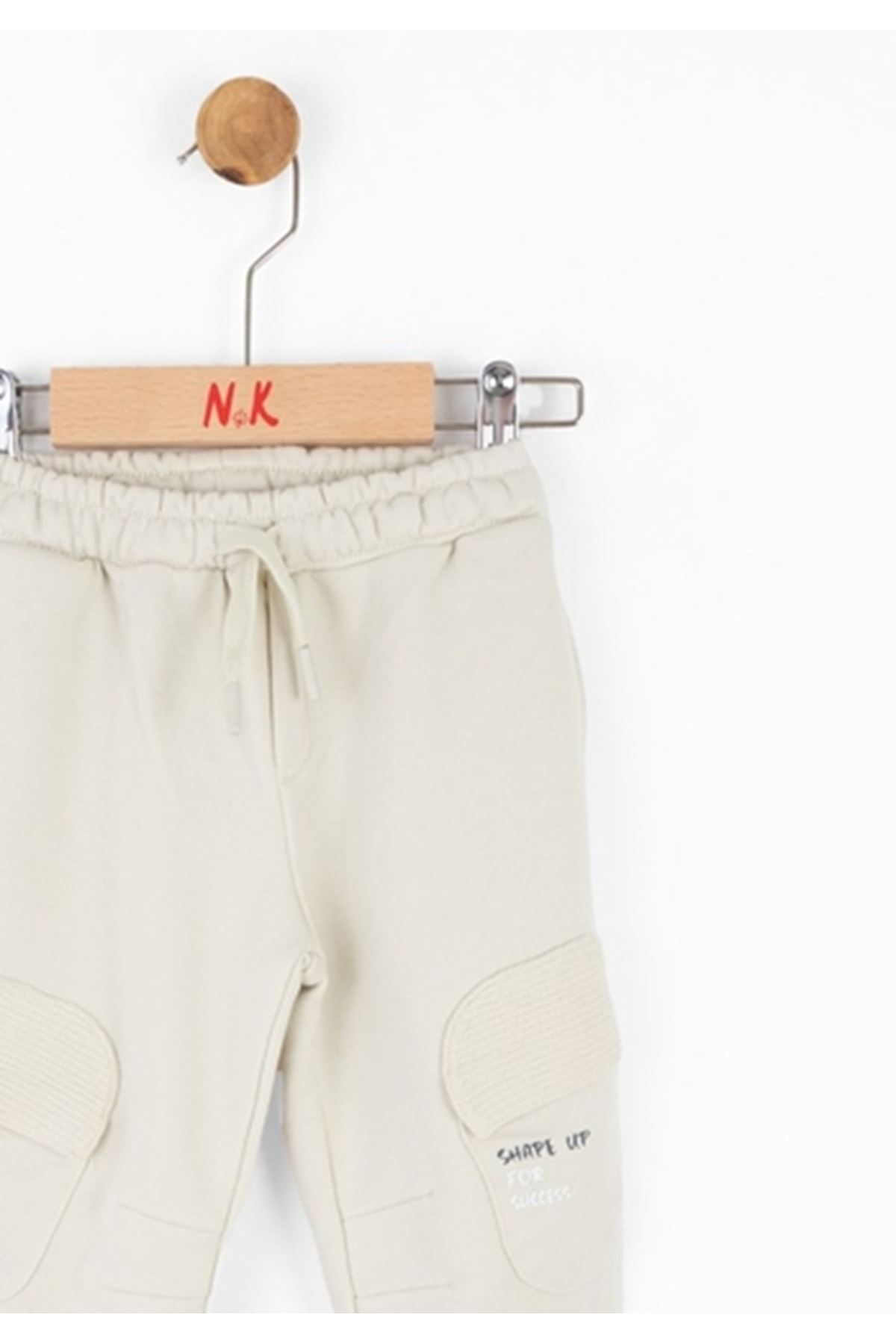 NK Kids 67607 POWER PANTOLON Krem 1/4